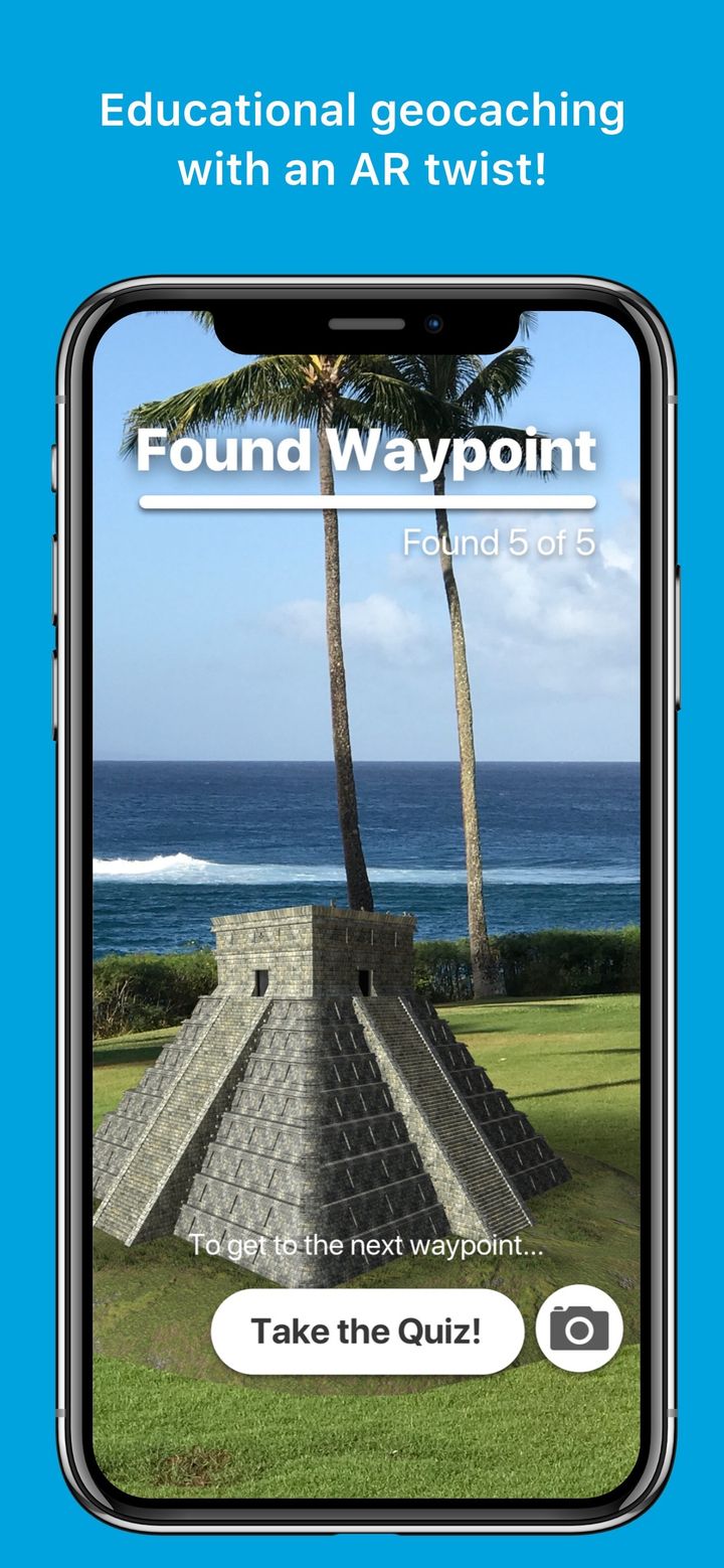 Found Waypoint: a Maya pyramid appears in AR on the grass by the ocean